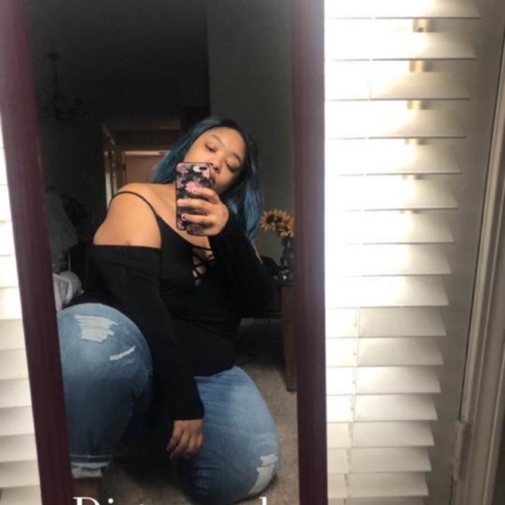 Light distressed blue jeans